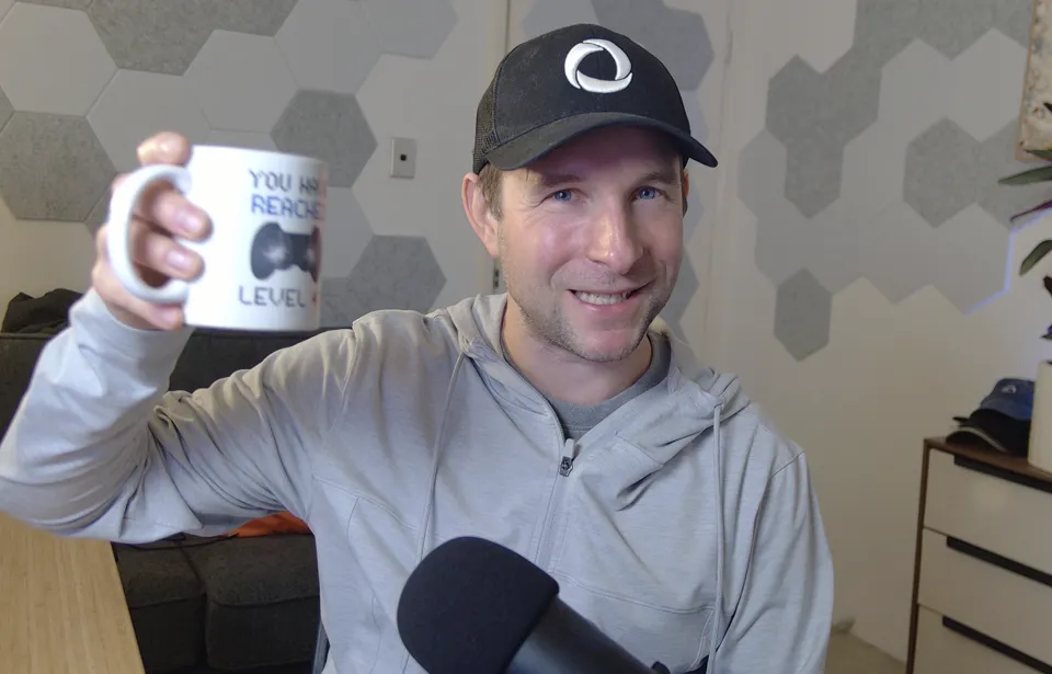 Mike Cann holding a mug